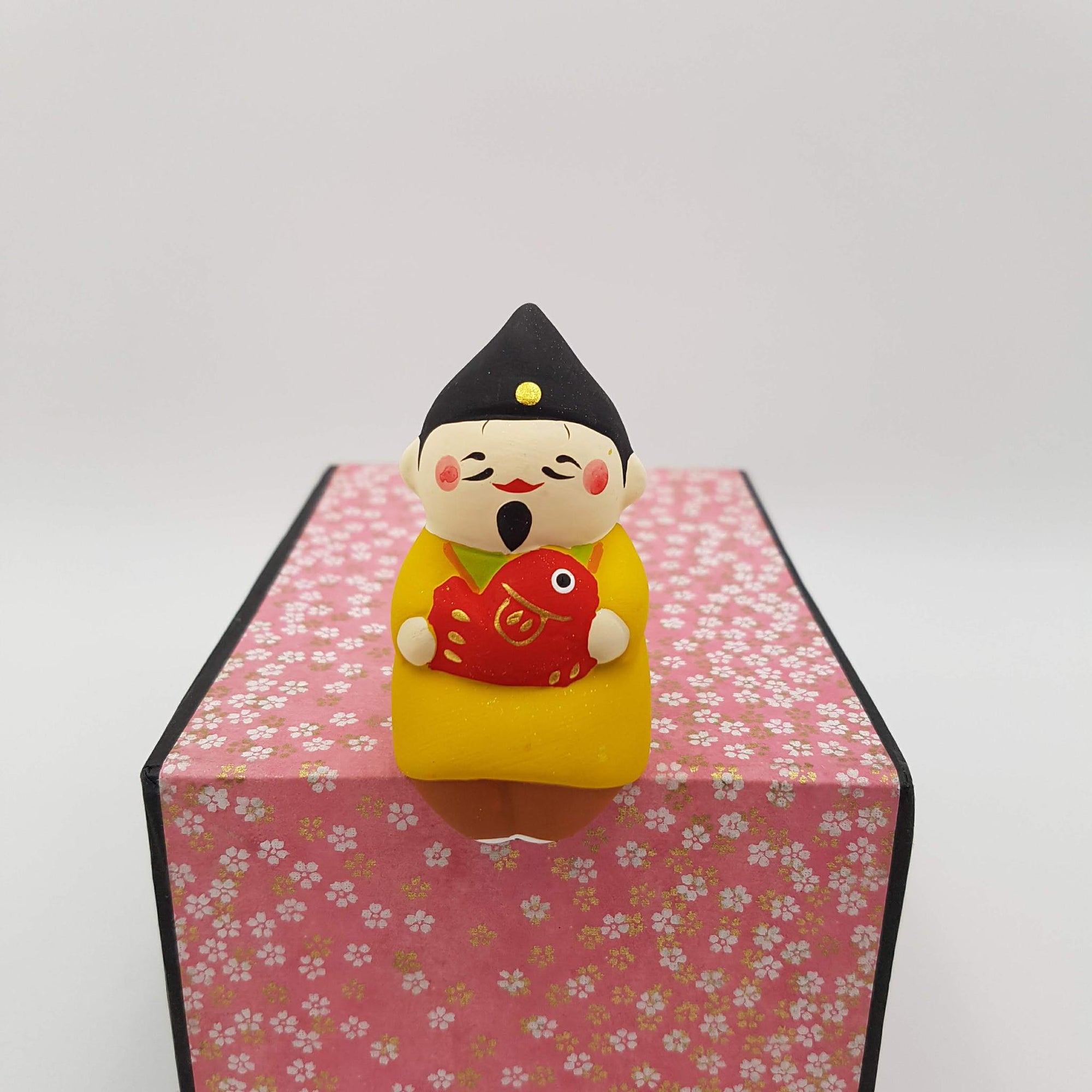 Figurines Osuwari assises en terre cuite et peint Japon fait main artisanal