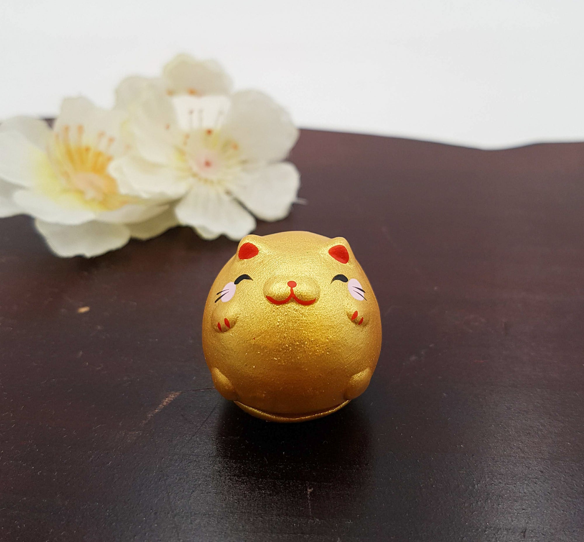 Figurine porte-bonheur culbuto Animaux Dorés en terre cuite fait main au Japon